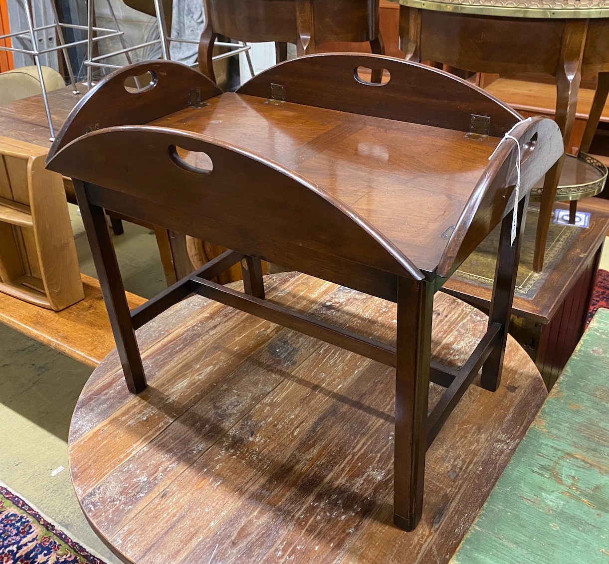 A George III style mahogany butler's tray on stand, width 69cm, depth 46cm, height 60cm